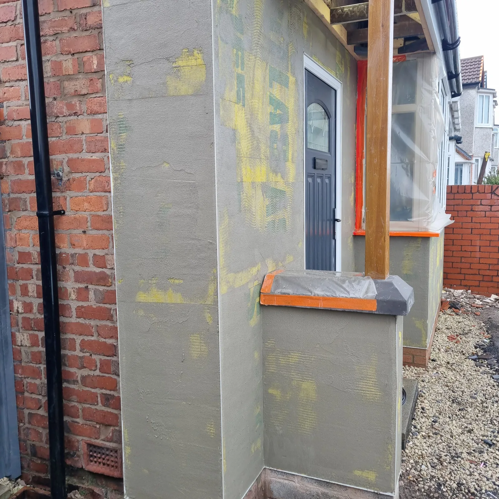 Basecoat over Atlas boards on a front porch and pier with capping, Southport