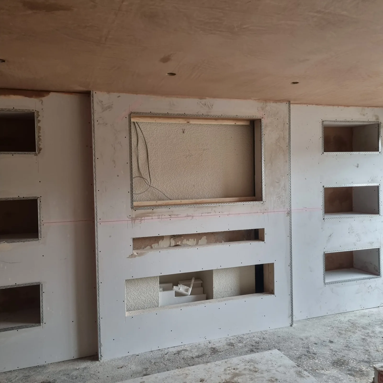 Media wall plasterboarded with beads before skimming, Southport