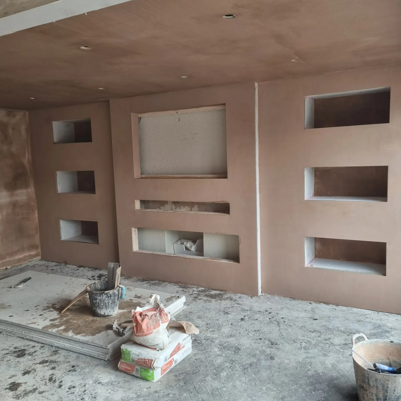 Full-width media wall with six alcoves, TV and fire recesses, skimmed, Southport