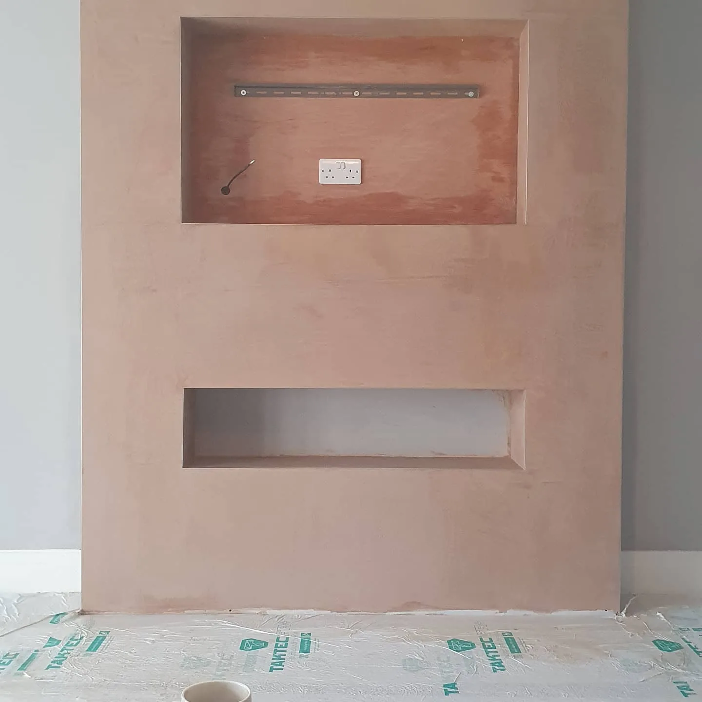 Bespoke media wall skimmed with TV and linear fire recesses, Southport