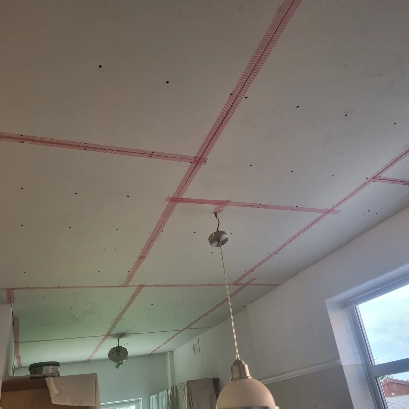 Scrim-taped kitchen ceiling boarded ready for skimming, Southport