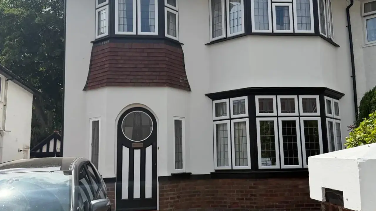 Silicone render finished across the full front elevation of a 1930s semi