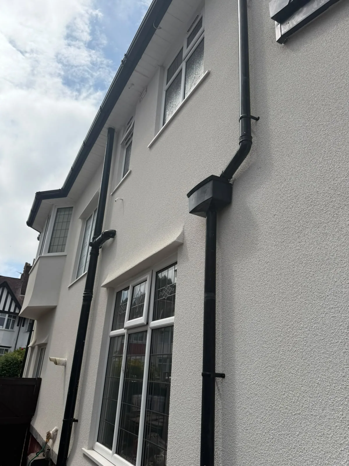 Finished silicone render on the side elevation of a Southport house