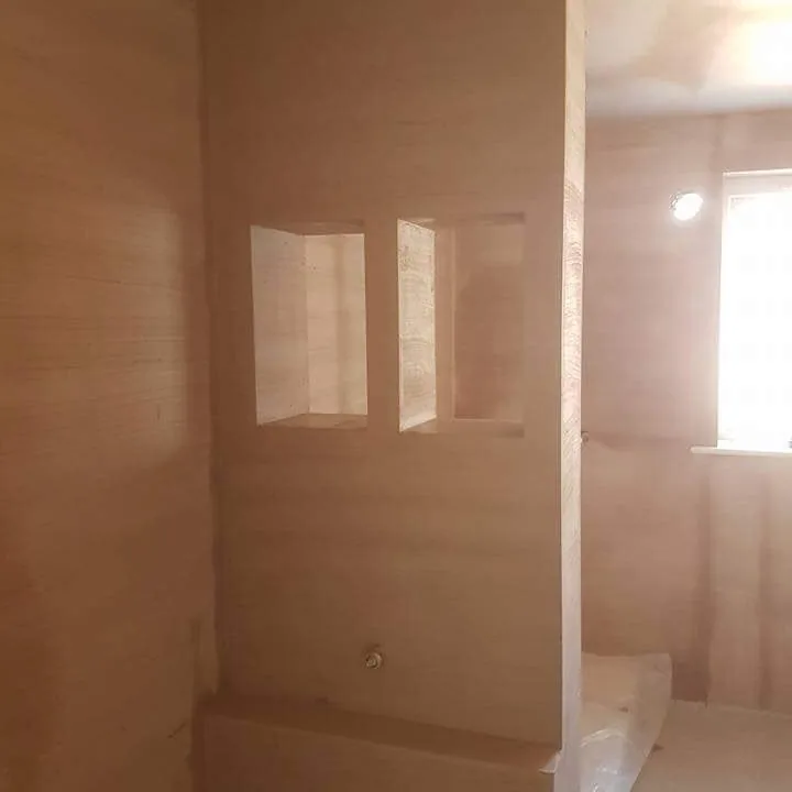 Skimmed shower room with recessed niches ready for tiling, Southport